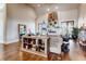 Cozy living room with hardwood floors, a fireplace, and tasteful decorations at 6963 S Espana Way, Centennial, CO 80016