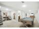 Finished basement with a pool table and seating area, perfect for entertaining at 5541 E 65Th Ave, Commerce City, CO 80022
