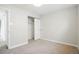 Cozy bedroom features neutral tones, carpet, closet, and natural light for a comfortable space at 5541 E 65Th Ave, Commerce City, CO 80022