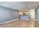 This living room features sleek, modern vinyl floors and stylish light-gray walls at 1125 N Washington St # 303, Denver, CO 80203