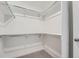 A walk-in closet that is ready for storage with chrome bars and shelving at 2090 S Haleyville Way, Aurora, CO 80018