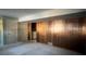 Unfinished basement space with wood panelling, ready to customize at 389 Uvalda St, Aurora, CO 80011
