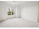 Spacious bedroom with a large bright window, offering great natural light at 19019 E Warren Dr # H104, Aurora, CO 80013
