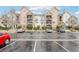 Well-maintained condo building with ample parking space at 19019 E Warren Dr # H104, Aurora, CO 80013