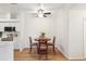 Cozy dining area adjacent to a breakfast bar, perfect for casual meals at 19019 E Warren Dr # H104, Aurora, CO 80013