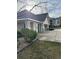 Exterior of the clubhouse with well-manicured lawn and landscaping at 19019 E Warren Dr # H104, Aurora, CO 80013