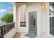 Inviting front patio showing stone facade, front door and exterior lighting at 19019 E Warren Dr # H104, Aurora, CO 80013