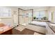 Bright bathroom featuring a glass shower, soaking tub, and sleek finishes at 28454 Meadow Dr, Evergreen, CO 80439