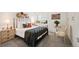 Inviting bedroom with stylish decor, comfortable furnishings, and ample natural light at 28454 Meadow Dr, Evergreen, CO 80439