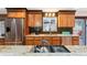 Bright kitchen with stainless appliances, granite counters, and wooden cabinets, perfect for cooking and entertaining at 28454 Meadow Dr, Evergreen, CO 80439