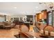 Open concept living space combines kitchen, dining, and living areas for seamless entertaining and Gathering time at 28454 Meadow Dr, Evergreen, CO 80439