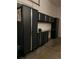 This garage features ample metal shelving for storage at 4501 S Tabor Ct, Morrison, CO 80465