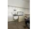 Spacious garage features utility sink and chest freezer at 4501 S Tabor Ct, Morrison, CO 80465