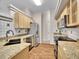 Bright kitchen featuring granite countertops and stainless steel appliances at 4501 S Tabor Ct, Morrison, CO 80465