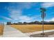 Street view of community with common area and a walking path under a blue sky at 131 S Vandriver Way, Aurora, CO 80018