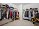 Large walk-in closet with ample storage space and organization racks for clothes and accessories at 131 S Vandriver Way, Aurora, CO 80018