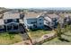 Home with backyard featuring fire pit and fenced yard at 2881 Black Canyon Way, Castle Rock, CO 80109
