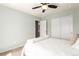 Bedroom with fresh paint, new carpet and a ceiling fan, plus a closet with sliding doors for storage at 2881 Black Canyon Way, Castle Rock, CO 80109