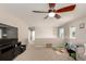 Spacious bonus room on the upper level offering carpet and natural light, a great secondary living space at 2881 Black Canyon Way, Castle Rock, CO 80109