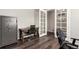 Office space with a safe, a desk, and French doors leading to another room at 2881 Black Canyon Way, Castle Rock, CO 80109