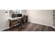 Functional home office with a wood desk, dual monitors, and modern flooring at 2881 Black Canyon Way, Castle Rock, CO 80109