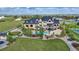 Sprawling estate boasts manicured lawns, a luxurious pool area, and impressive architecture, blending luxury and outdoor living at 15355 Zuni St, Broomfield, CO 80023