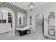 Elegant bathroom featuring a soaking tub, walk-in shower and unique tilework at 15355 Zuni St, Broomfield, CO 80023