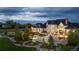 Dusk view of home featuring a spa, outdoor living area, and extensive landscaping at 15355 Zuni St, Broomfield, CO 80023