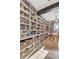Large pantry offering generous storage space with custom shelves and lighting at 15355 Zuni St, Broomfield, CO 80023