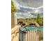 Elevated view of a luxurious pool area complete with a water slide, seating, and beautiful stone accents at 15355 Zuni St, Broomfield, CO 80023
