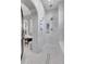 Luxurious shower featuring marble surround, multiple shower heads, and bench seating at 15355 Zuni St, Broomfield, CO 80023