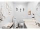 Charming powder room with stylish decor, modern fixtures, and a neutral color palette at 474 Black Feather Loop # 419, Castle Rock, CO 80104