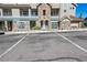 Attractive building with a blend of stone and siding, complemented by convenient parking spots at 474 Black Feather Loop # 419, Castle Rock, CO 80104