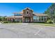 The building's facade features stone accents, convenient parking spaces, and a welcoming entrance at 474 Black Feather Loop # 419, Castle Rock, CO 80104