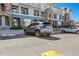 Well-maintained parking area with ample space and visible building facade in the background at 474 Black Feather Loop # 419, Castle Rock, CO 80104