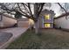 Charming home boasts a well-maintained exterior with a spacious driveway, lush lawn, and attached garage at 9333 Cattail Ct, Highlands Ranch, CO 80126