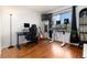 Home office with hardwood floors, a large window with lots of natural light, and lots of plants at 9333 Cattail Ct, Highlands Ranch, CO 80126