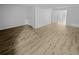 Finished basement with hardwood floors and multiple doors at 2685 S Dayton Way # 326, Denver, CO 80231