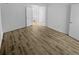 Spacious bedroom with hardwood floors and access to bathroom at 2685 S Dayton Way # 326, Denver, CO 80231