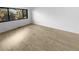 Bright bedroom with large window and wood-look floors at 2685 S Dayton Way # 326, Denver, CO 80231