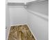 Spacious closet with double rods and brown tile flooring at 2685 S Dayton Way # 326, Denver, CO 80231
