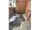 Back exterior view of townhome with concrete patio at 2685 S Dayton Way # 326, Denver, CO 80231