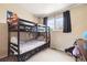 Shared bedroom featuring a bunk bed, creating a fun and functional space for or guests at 7984 Chase Cir # 68, Arvada, CO 80003