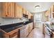 Well-equipped kitchen with stainless steel appliances, sleek countertops, and ample cabinet space at 7984 Chase Cir # 68, Arvada, CO 80003