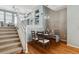 Bright dining room with hardwood floors and a chandelier at 9818 E Carolina Pl, Aurora, CO 80247