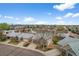 Aerial view of a suburban neighborhood showcasing well-maintained homes and green spaces at 4927 Greenwich Way, Highlands Ranch, CO 80130