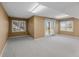 Bonus room offers lots of natural light and neutral paint and flooring at 4927 Greenwich Way, Highlands Ranch, CO 80130