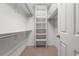 Walk-in closet with plenty of storage space and adjustable shelving at 4927 Greenwich Way, Highlands Ranch, CO 80130