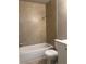 Bathroom with tiled shower-tub combo at 772 Victor St, Aurora, CO 80011