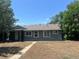 Charming single-story home with inviting curb appeal and mature trees at 772 Victor St, Aurora, CO 80011